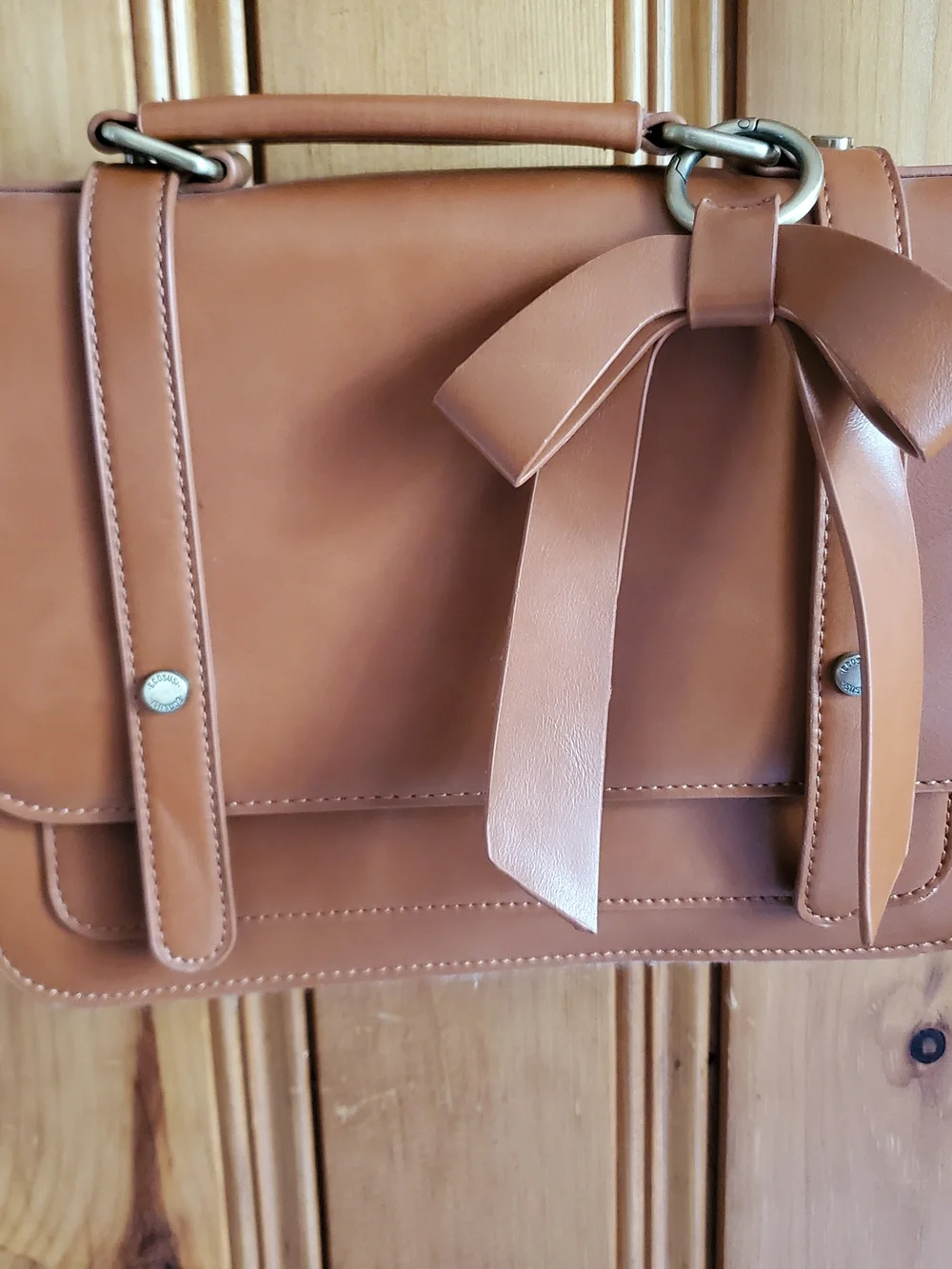 Classic Tan Satchel Handbag with Bow Accent
